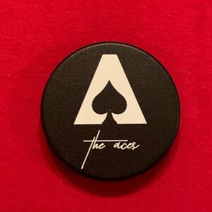 The Aces band black and white phone pop holder